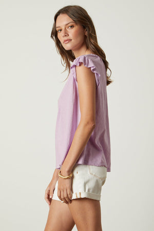 Stacy tank in lavender thistle tucked into white denim shorts side