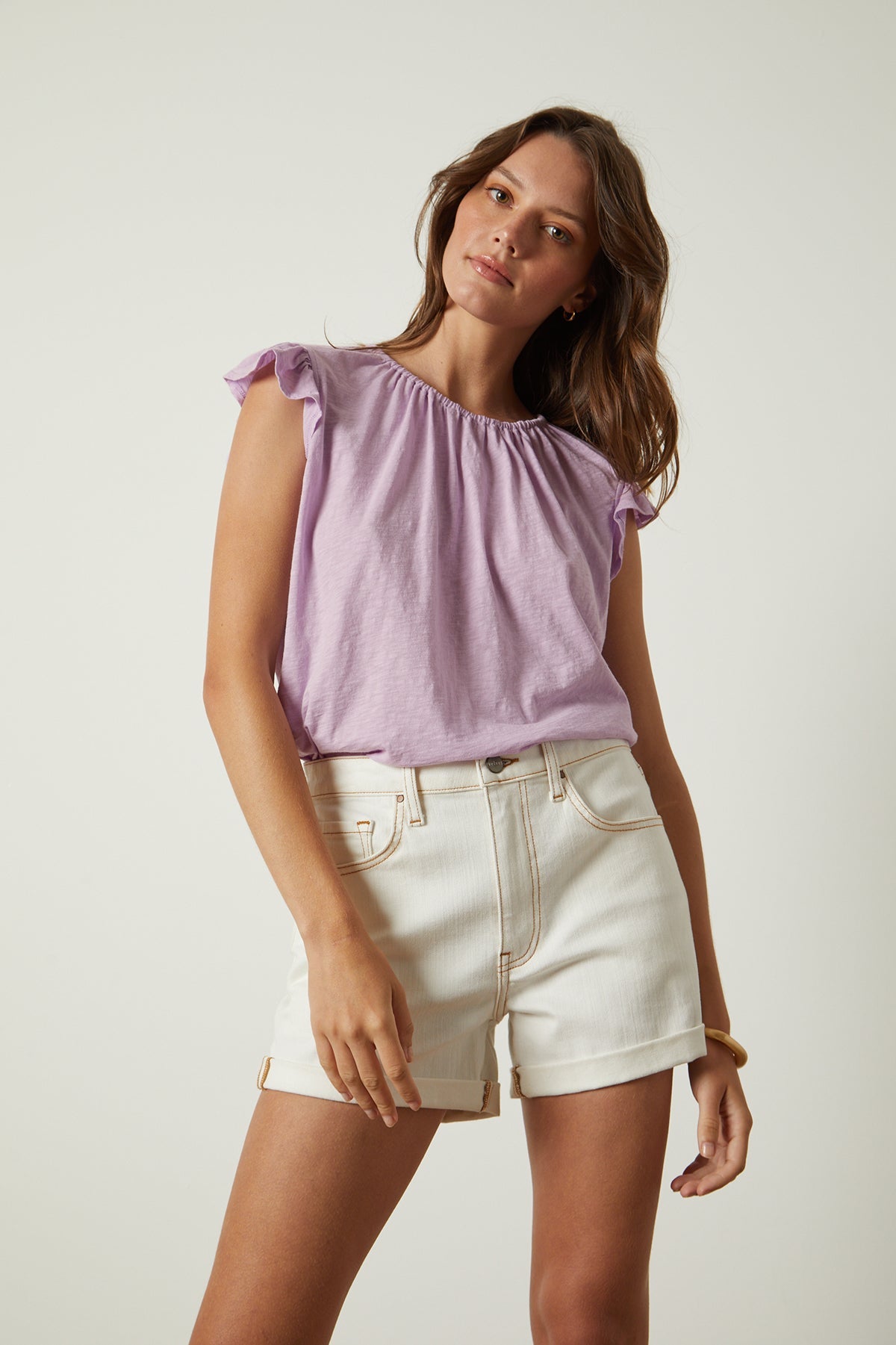 Stacy tank in lavender thistle tucked into white denim shorts front-26496397246657