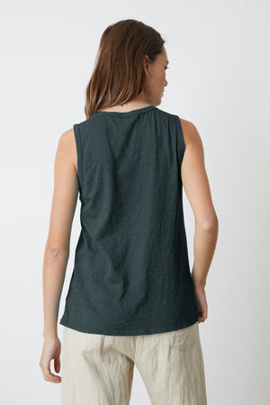 the back view of a woman wearing a Velvet by Graham & Spencer TAURUS COTTON SLUB TANK tank top.
