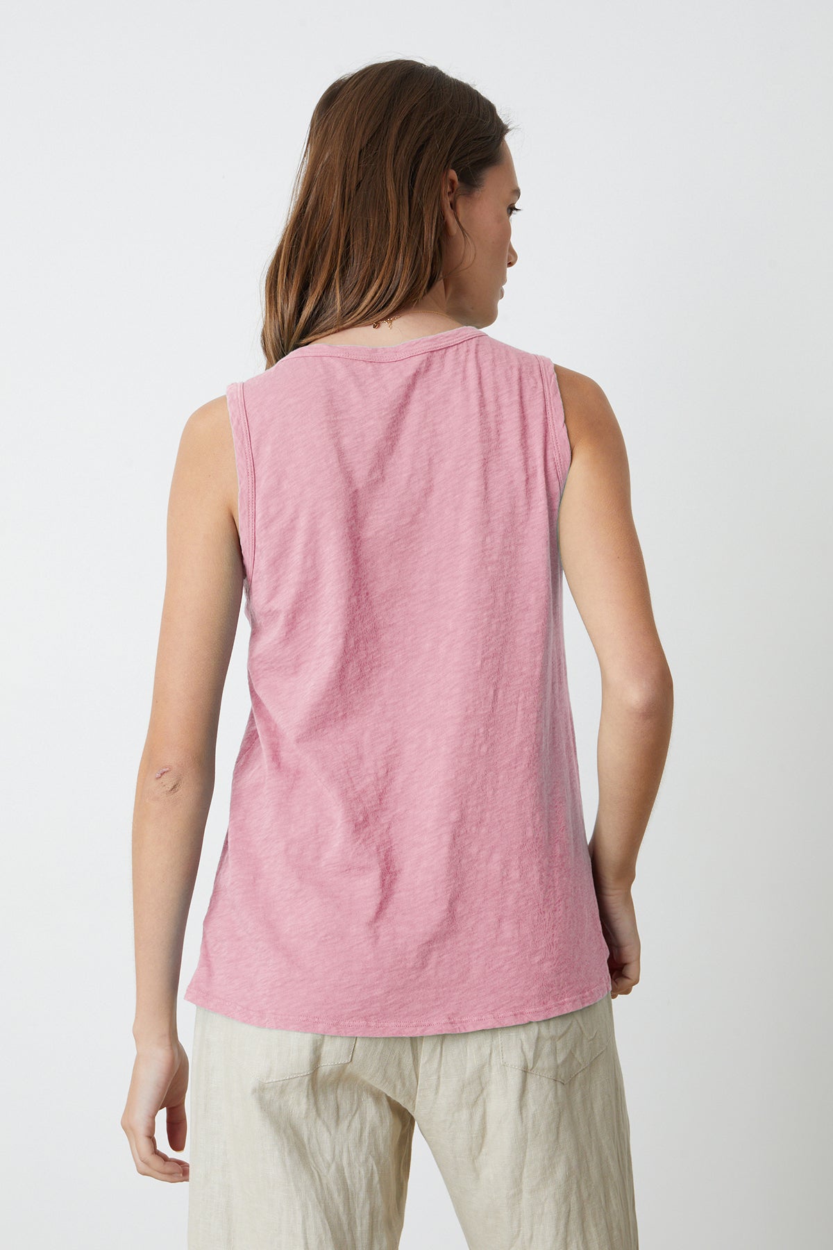 The back view of a woman sporting a Velvet by Graham & Spencer TAURUS COTTON SLUB TANK.-35982876672193
