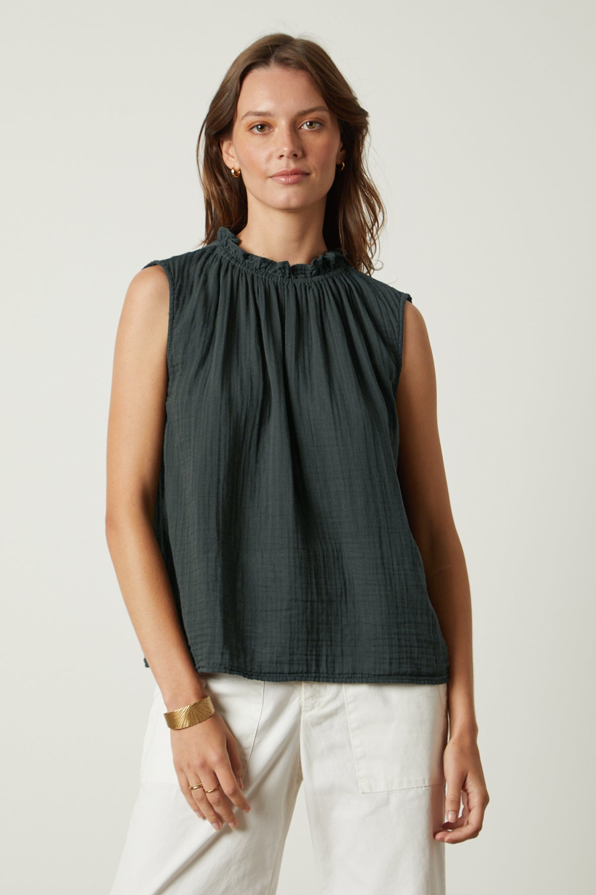 The Velvet by Graham & Spencer BIANCA COTTON GAUZE TANK TOP is made of linen and has a ruffled sleeve.-26317043171521