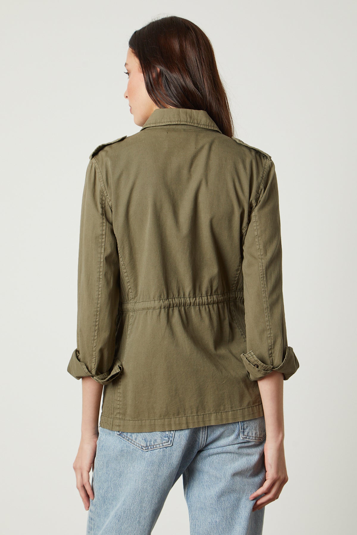 The view of a woman wearing a Velvet by Graham & Spencer RUBY LIGHT-WEIGHT ARMY JACKET.-35207198638273