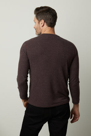 The back view of a man wearing a Velvet by Graham & Spencer BECKER COZY JERSEY CREW.