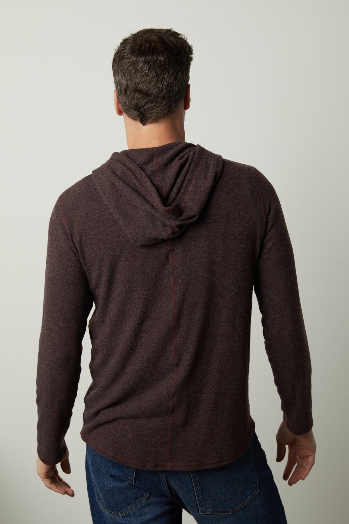 The back view of a man wearing a Velvet by Graham & Spencer BYRD COZY JERSEY HOODIE.-35547521319105