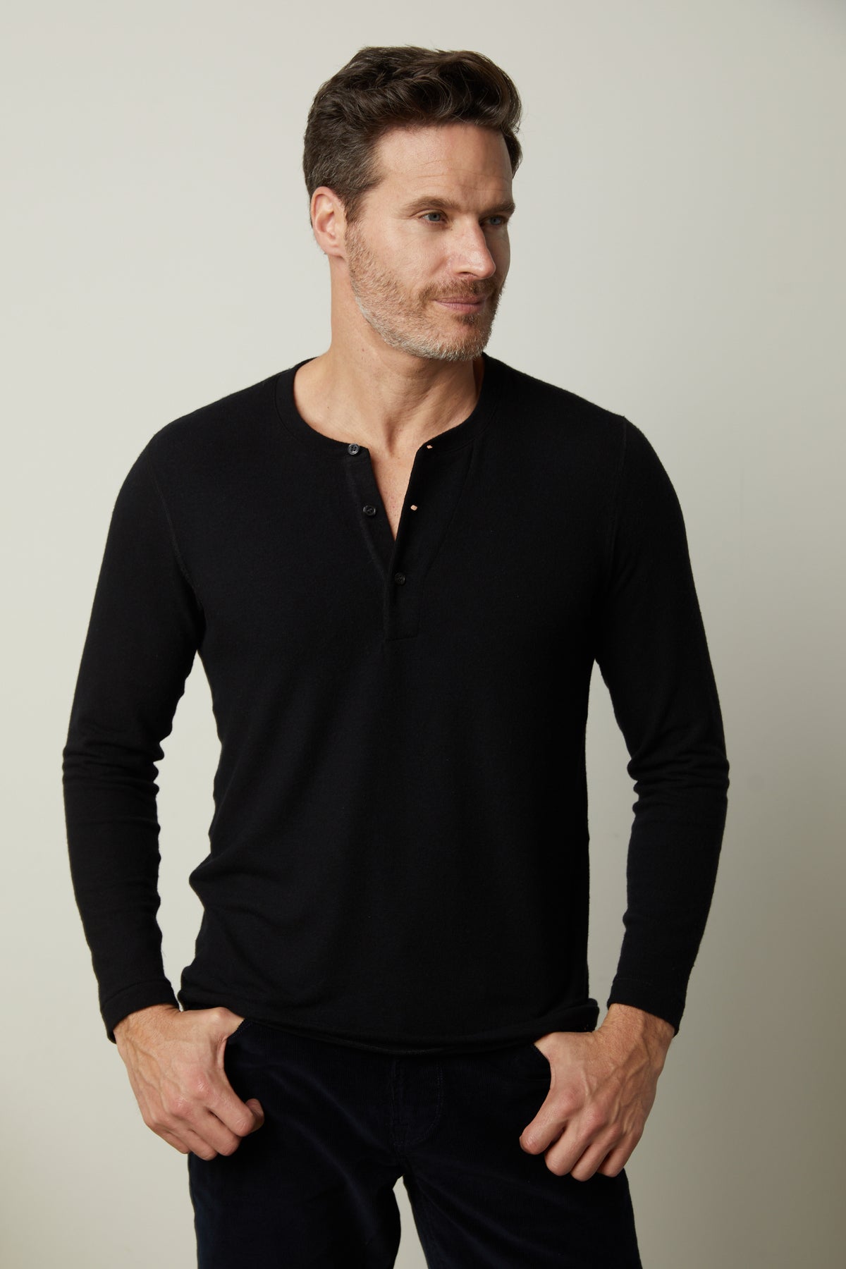  A man wearing a cozy Velvet by Graham & Spencer RYLAND HENLEY shirt. 