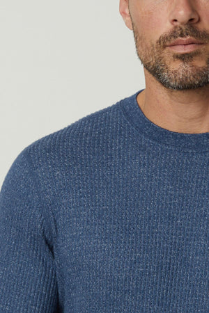 A premium Velvet by Graham & Spencer PONCHO THERMAL CREW man's blue sweater, perfect for cooler days.