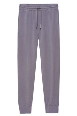 The Velvet by Graham & Spencer CROSBY JOGGER is a pair of light gray joggers featuring an elastic waistband, drawstring, side pockets, and cuffed ankles, displayed flat on a white background.