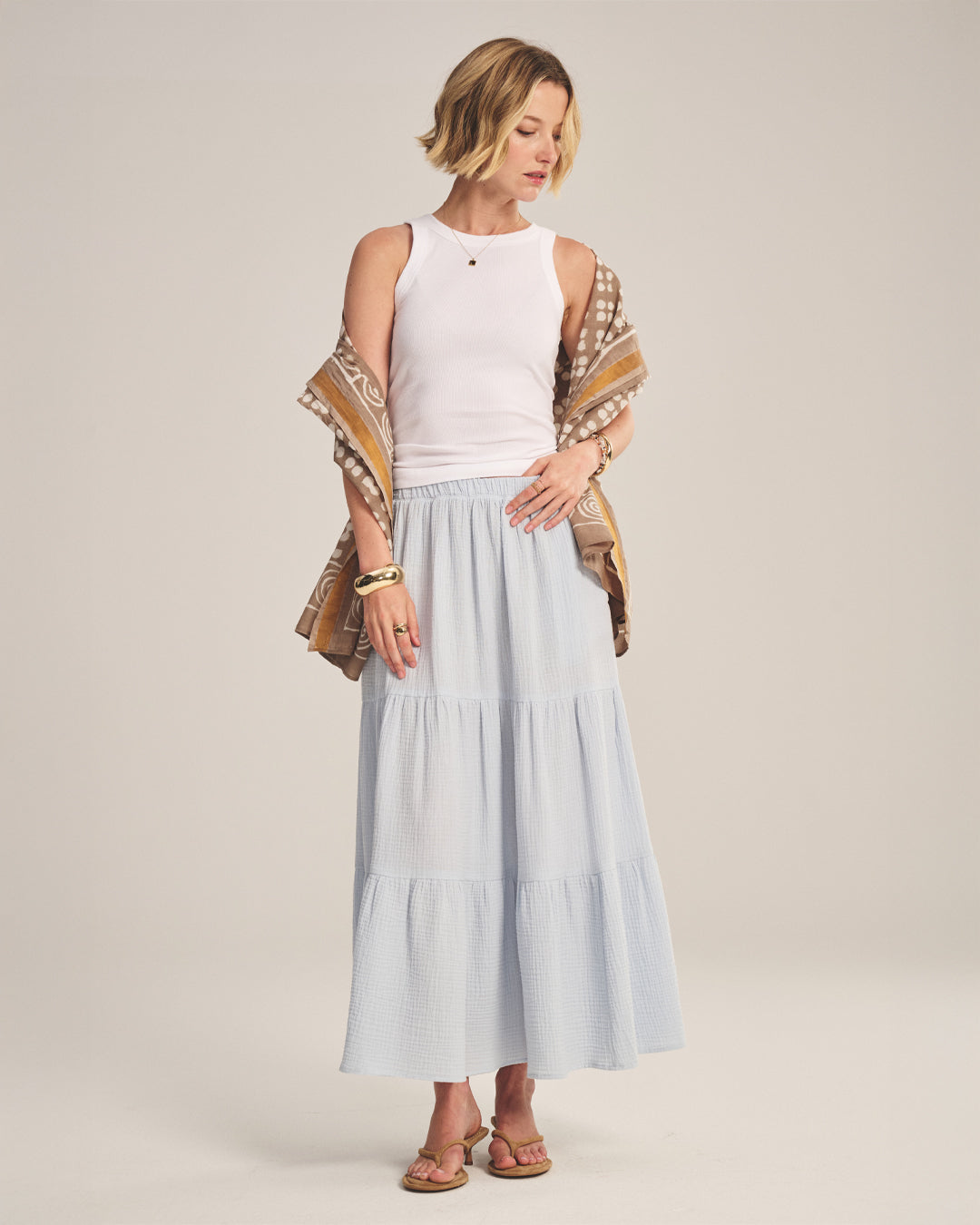 A woman wearing the Danielle Skirt in Ice by Velvet by Graham & Spencer.