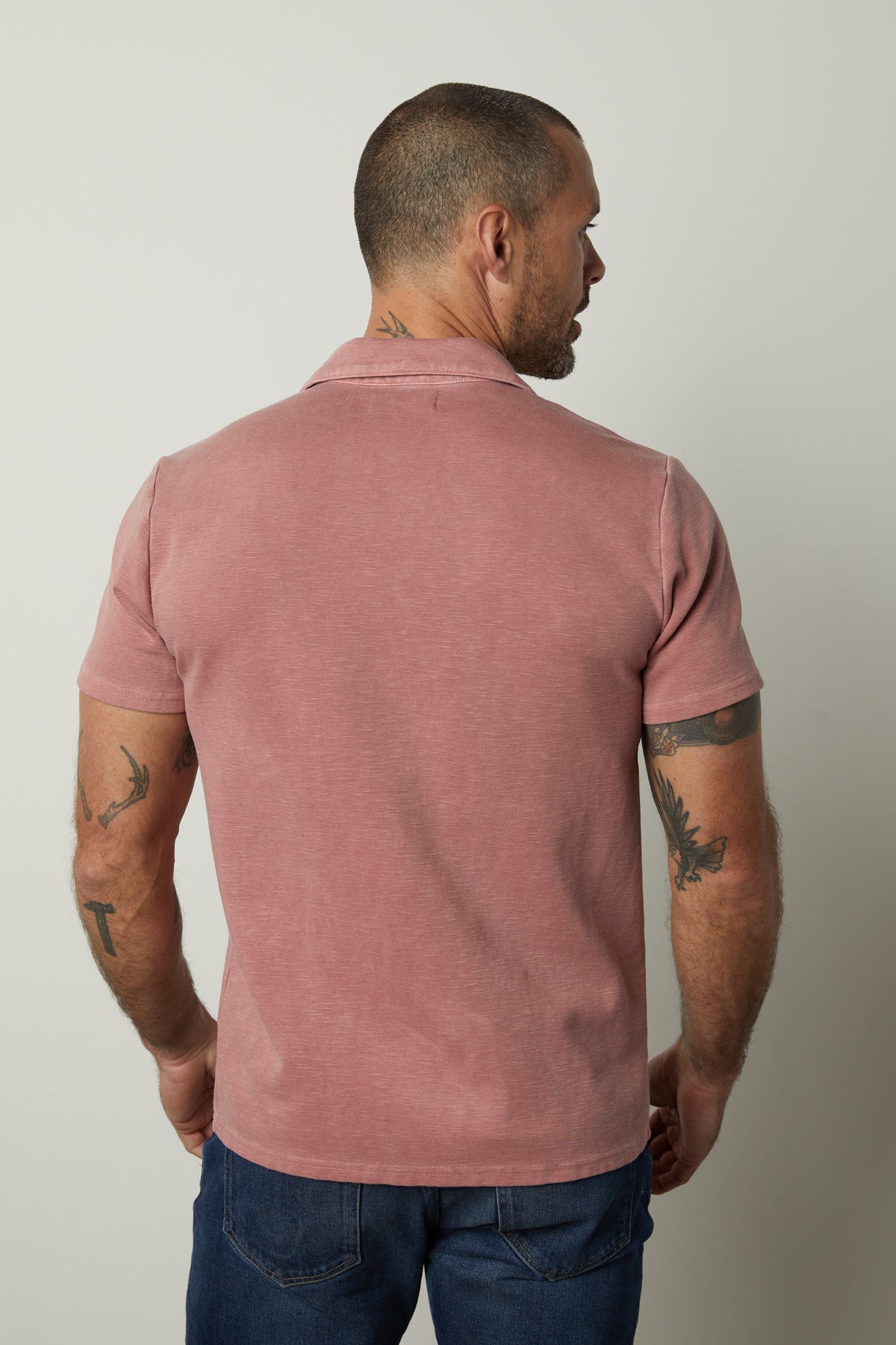 The back of a man wearing a Velvet by Graham & Spencer DILAN COTTON BLEND POLO shirt.-26827671699649