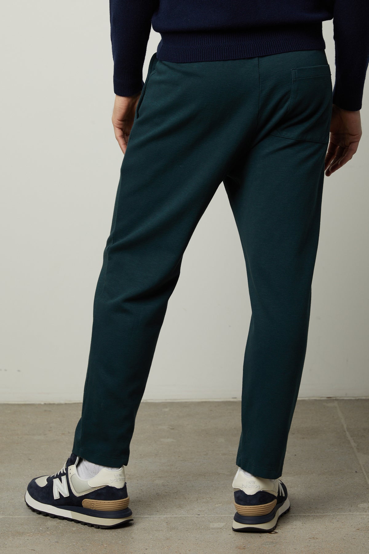 The back view of a man wearing Velvet by Graham & Spencer's PARKER SWEATPANT.-35179764973761