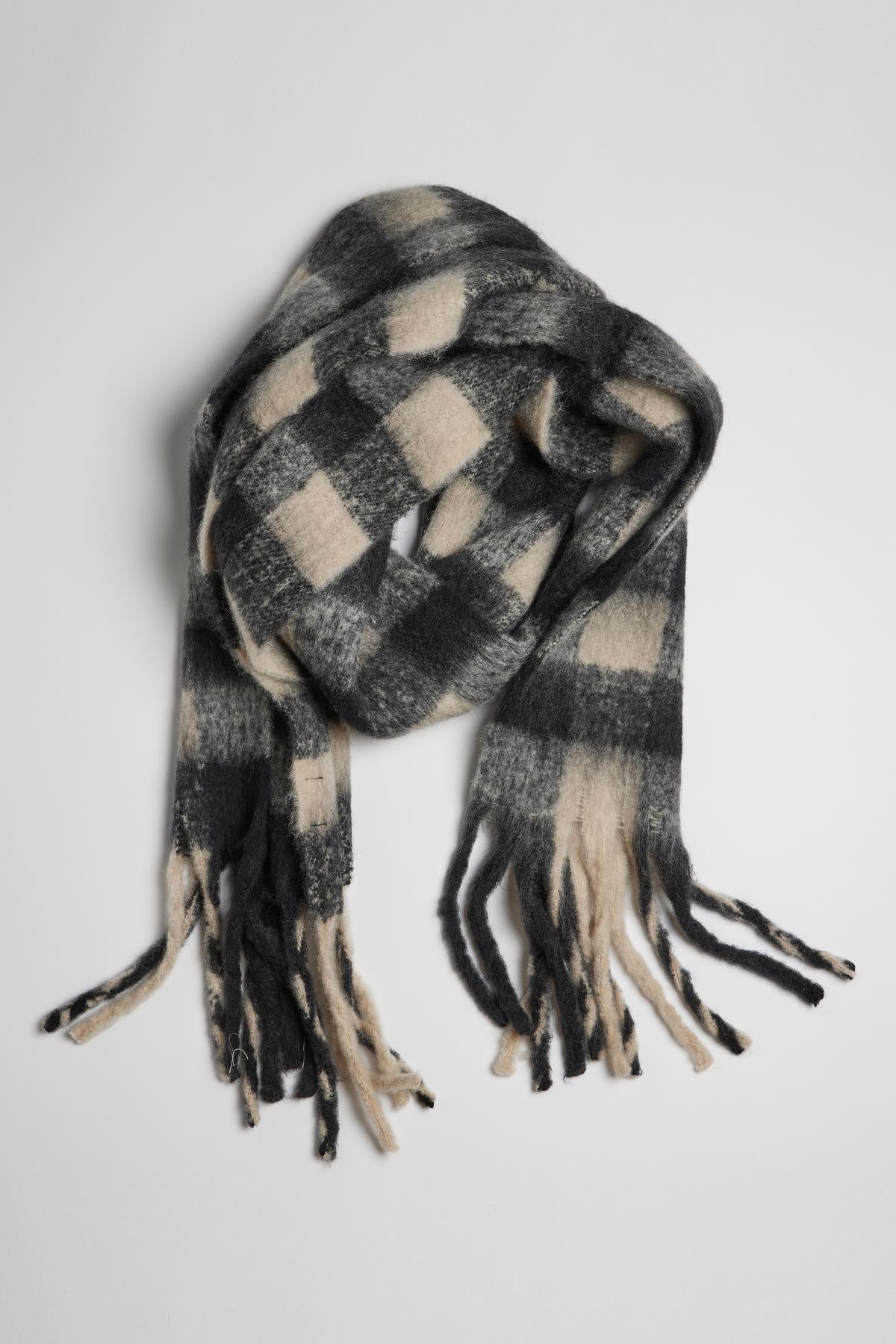 An ELLE plaid scarf from Velvet by Graham & Spencer, with fringe ends, offering warmth and comfort.-35211033477313
