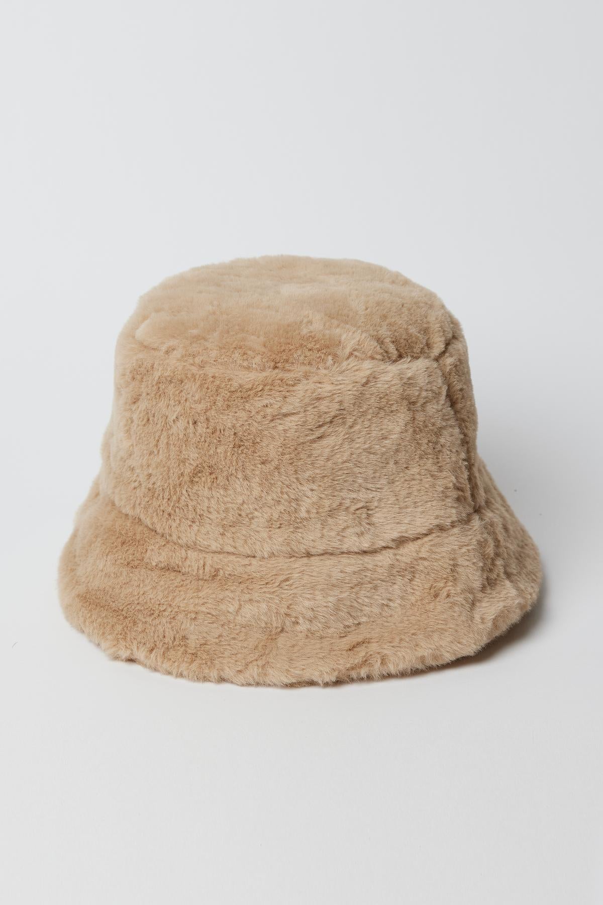   A Velvet by Graham & Spencer FAUX FUR BUCKET HAT on a white surface. 