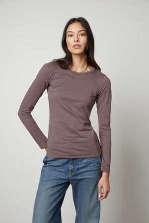 The ZOFINA GAUZY WHISPER FITTED CREW NECK TEE in a dark brown color is made of soft cotton by Velvet by Graham & Spencer.