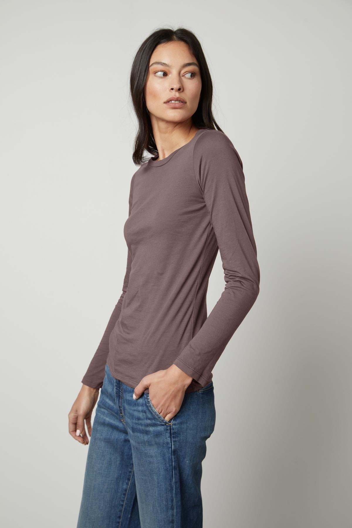 The Velvet by Graham & Spencer ZOFINA GAUZY WHISPER FITTED CREW NECK TEE in dark brown is perfect for any occasion with its universally flattering cut and soft, gauzy whisper cotton fabric.-35503498854593