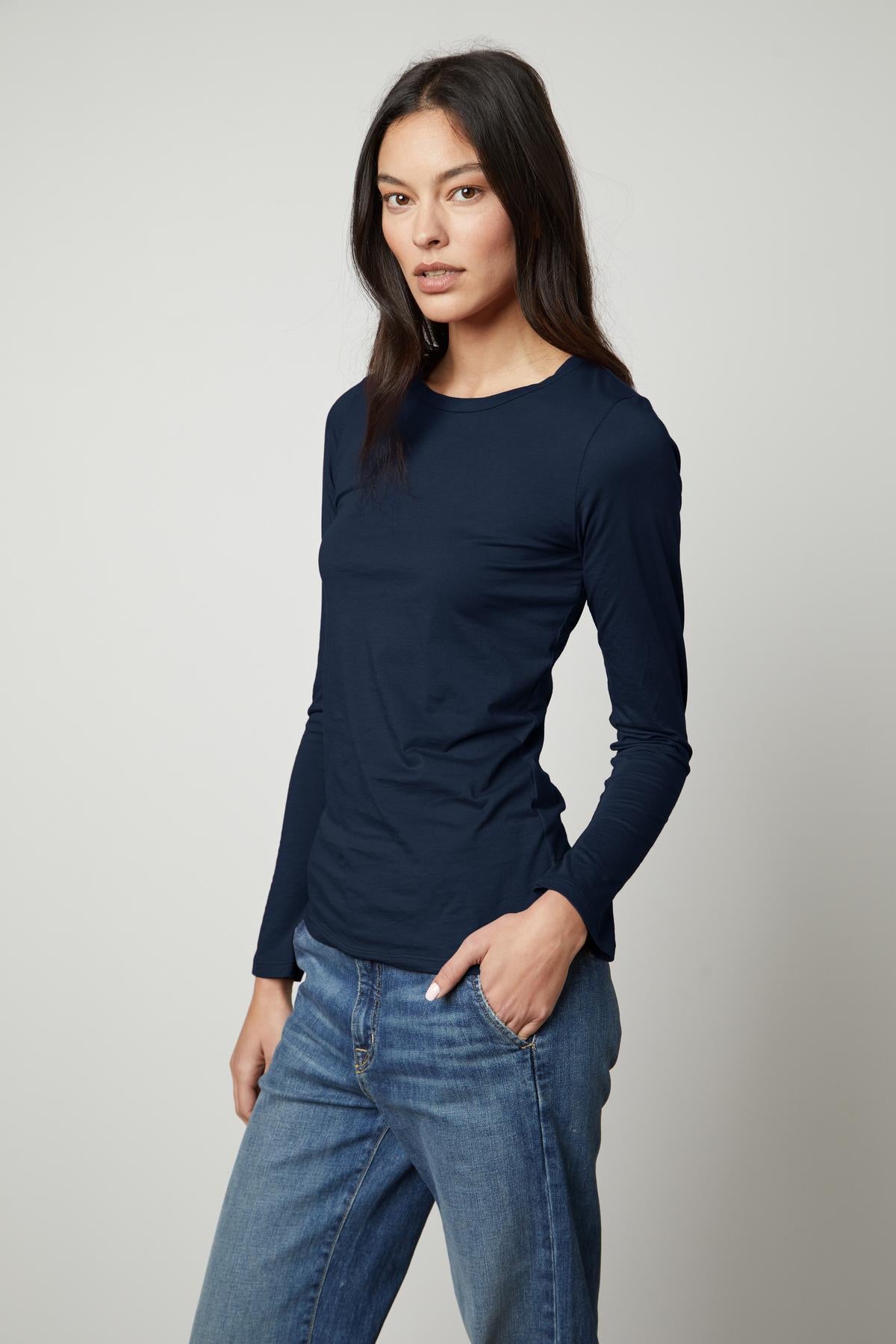 The ZOFINA gauzy whisper fitted crew neck tee by Velvet by Graham & Spencer in navy features a crew neck.-35503490957505