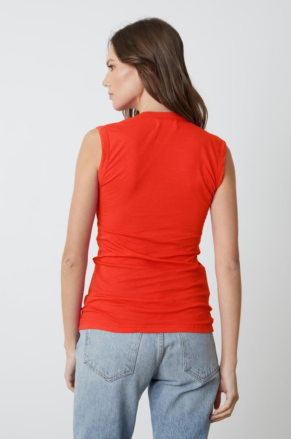 Estina Fitted Tank Top in bright cardinal red gauzy whisper with light blue denim back-26715129807041