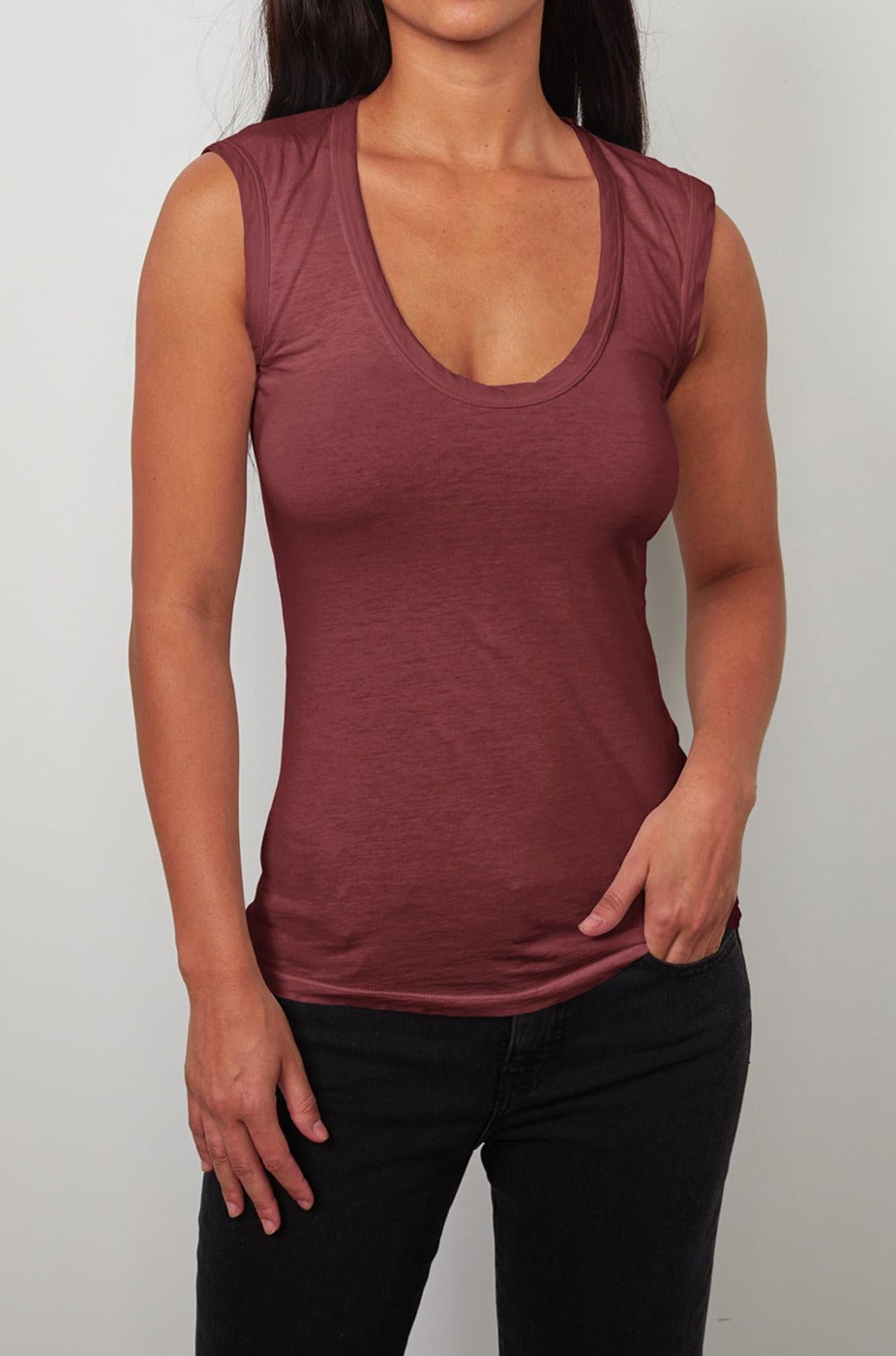   a woman wearing a ESTINA GAUZY WHISPER FITTED TANK TOP from Velvet by Graham & Spencer. 