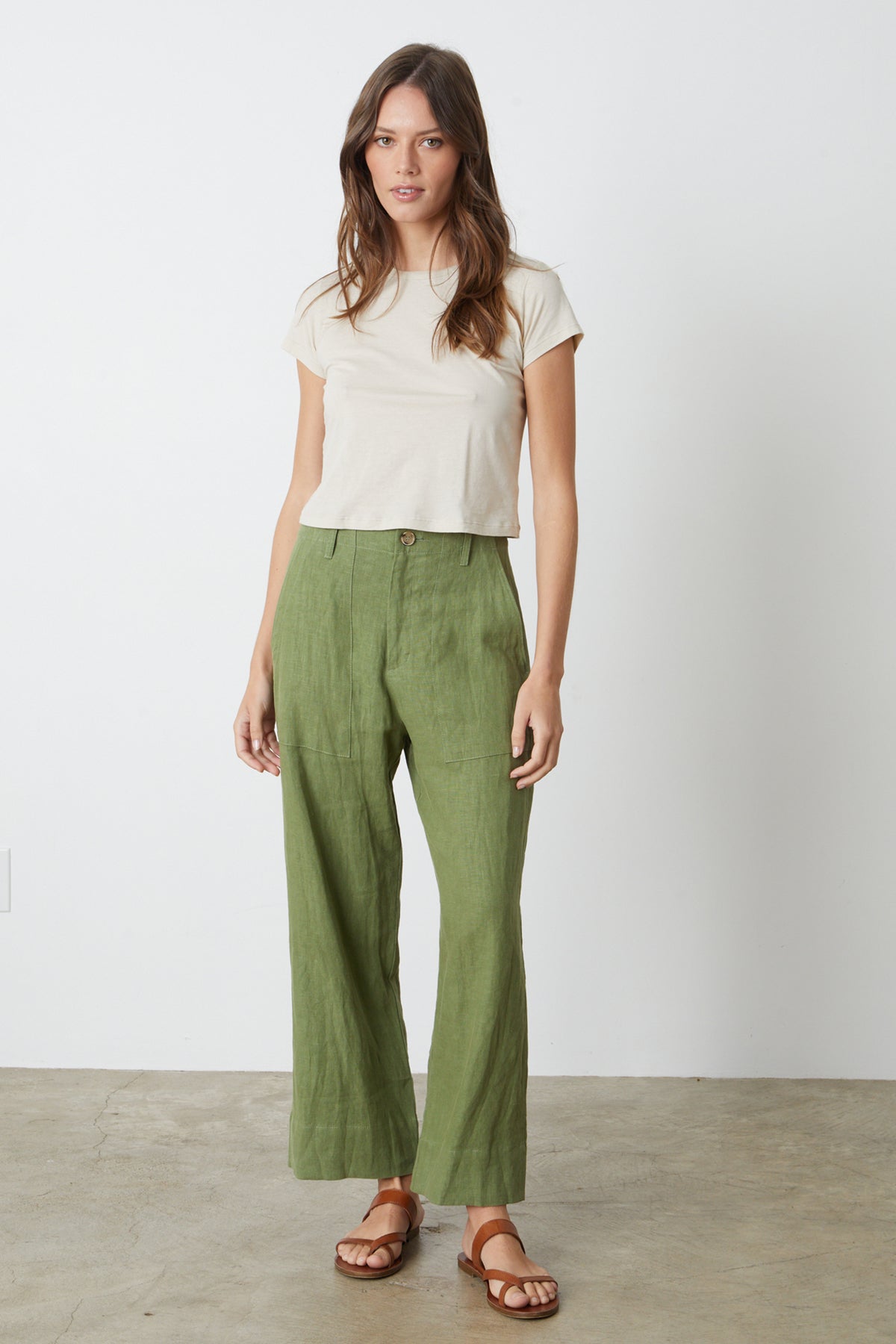   a woman wearing Velvet by Graham & Spencer DRU HEAVY LINEN PANT and a white t-shirt. 