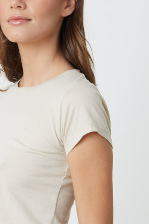 a woman wearing a Velvet by Graham & Spencer NINA CROPPED CREW NECK TEE.