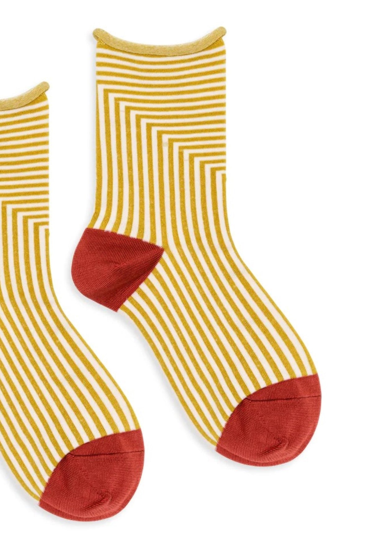   The CORBUSIER CREW SOCKS BY HANSEL FROM BASEL feature yellow and white stripes with red heel and toe accents, offering a unique design that adds a pop of color to any outfit. 