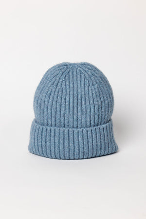 The KEY BEANIE by Velvet by Graham & Spencer is a light blue knit hat with a folded brim, shown upright on a plain white background.