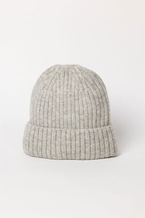 The KEY BEANIE by Velvet by Graham & Spencer is a light gray ribbed knit beanie with a folded brim, shown against a plain white background.