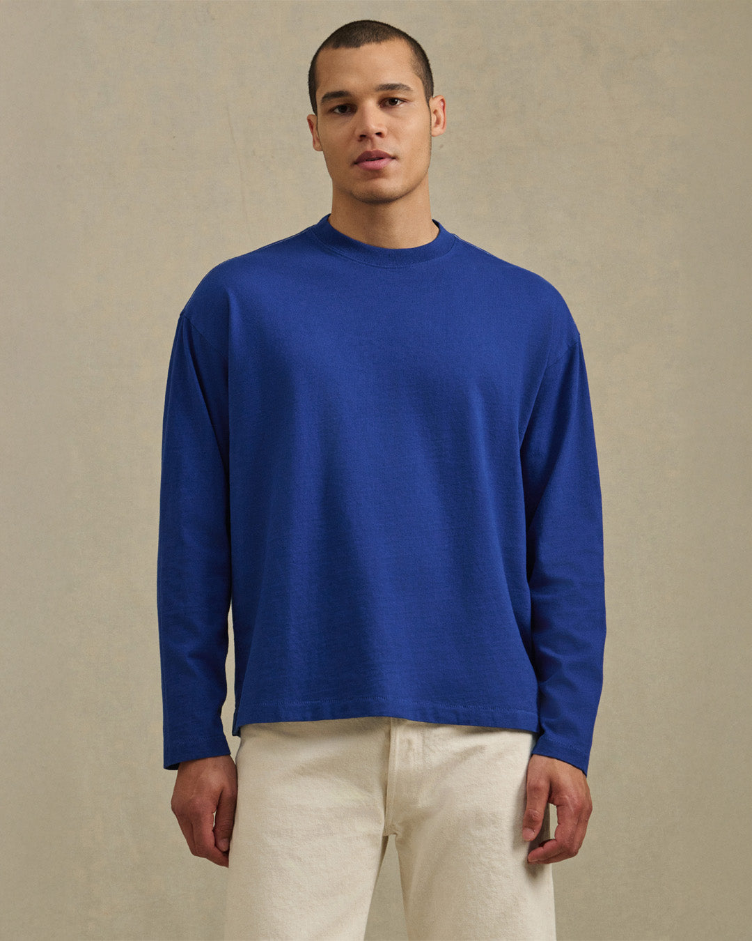A man wearing the Theo Tee in Electric by Velvet by Graham & Spencer.