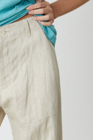 a woman wearing a blue t-shirt and Velvet by Graham & Spencer DRU HEAVY LINEN PANT.
