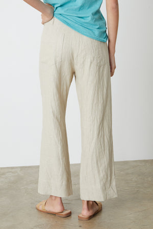 The back view of a woman wearing Velvet by Graham & Spencer's DRU HEAVY LINEN PANT.