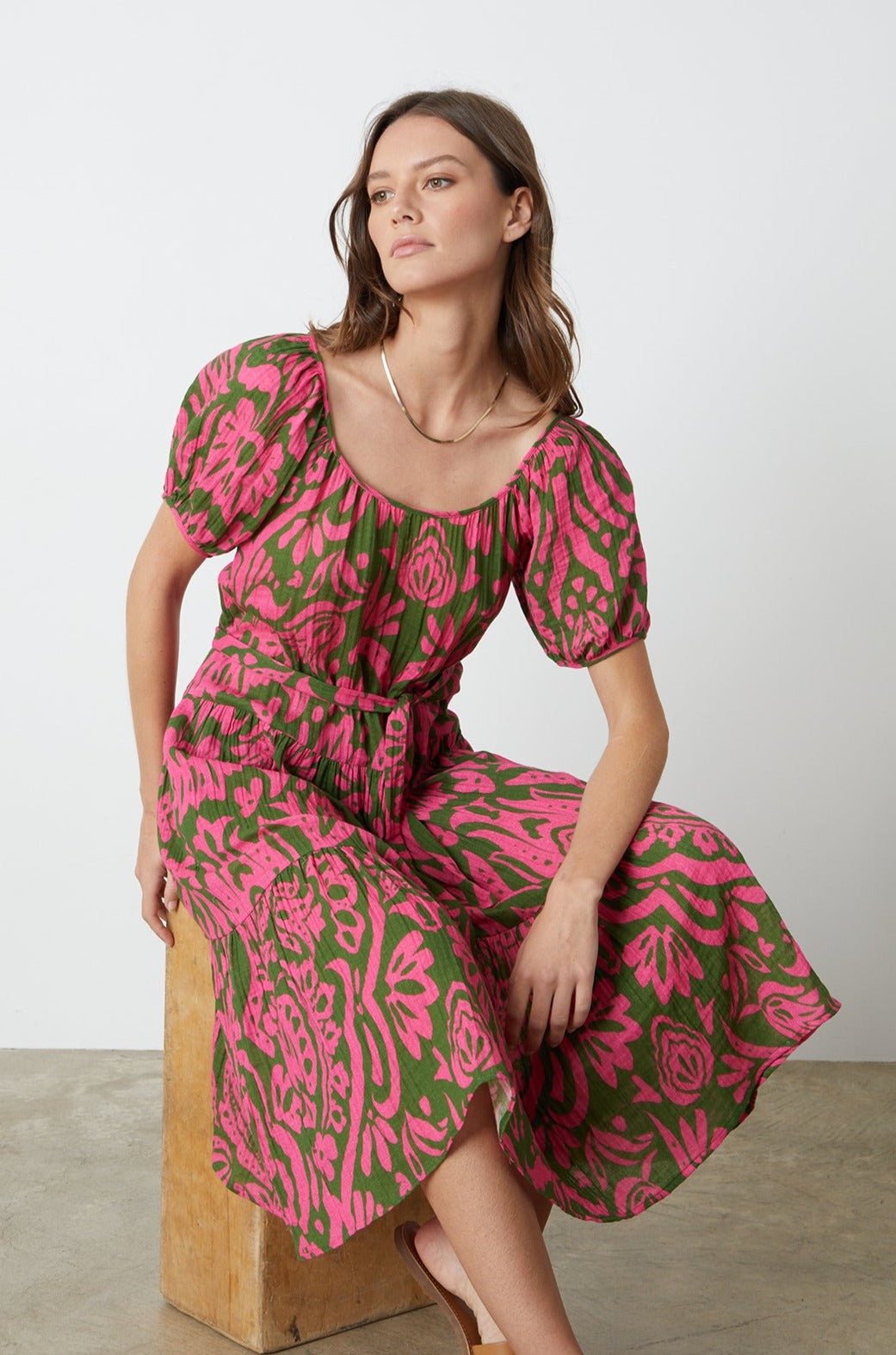 The model is wearing the Velvet by Graham & Spencer MADILYN PRINTED COTTON GAUZE MIDI Dress.-26342678495425