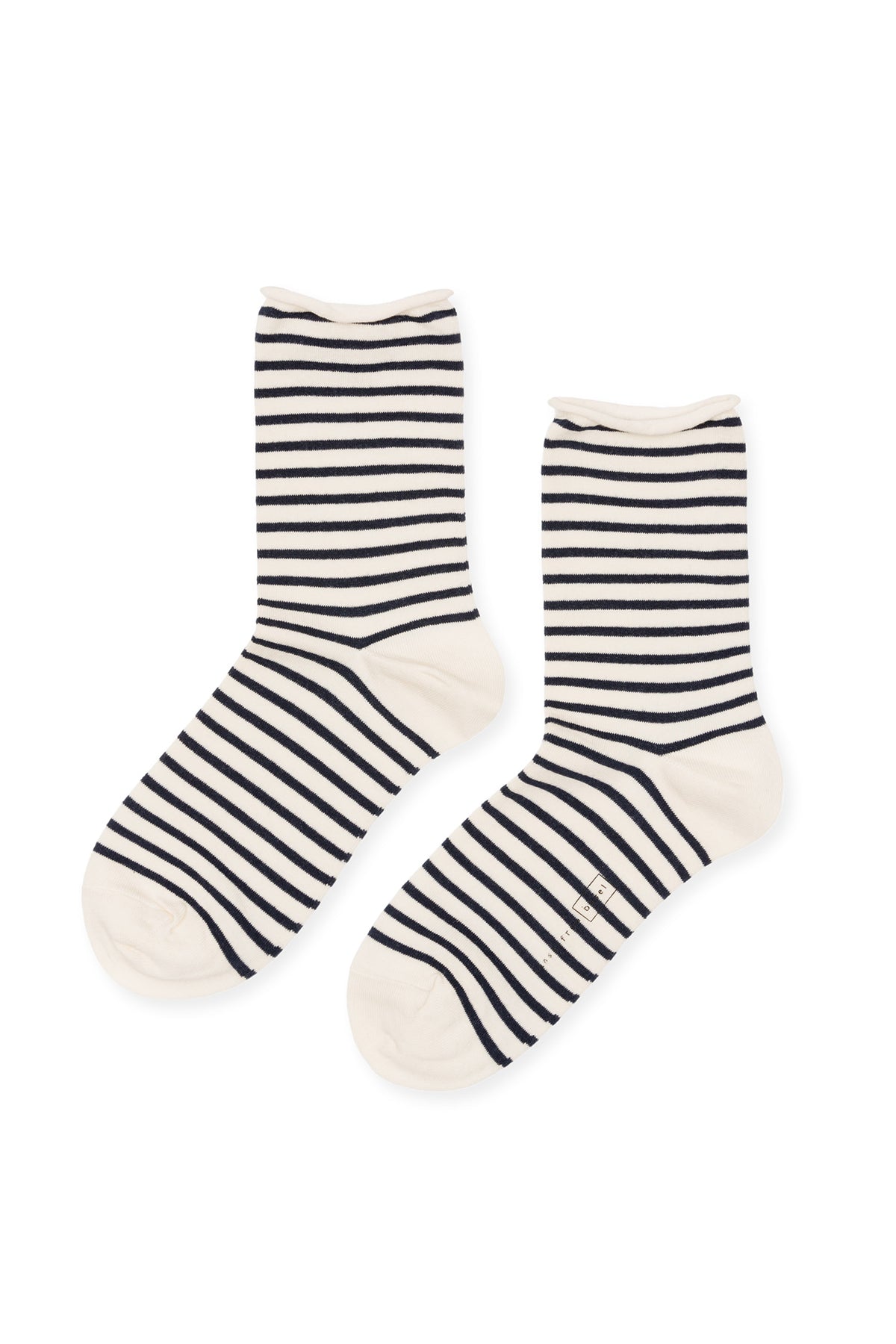 A pair of Nautical Stripe Crew Socks by Hansel from Basel, featuring white fabric with black horizontal stripes, lays flat against a white background.-35710839685313