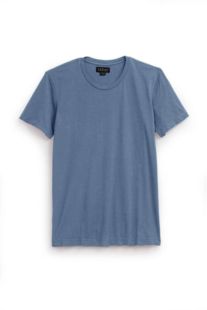 The HOWARD TEE by Velvet by Graham & Spencer is a plain blue short-sleeved T-shirt with a round neckline made from Pima cotton jersey, displayed on a white background.