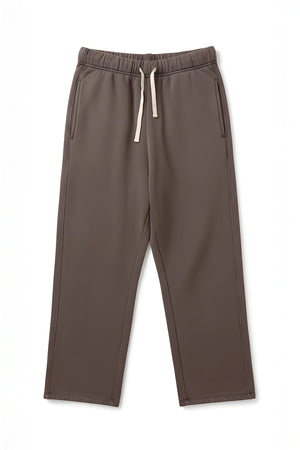 The HUDSON SWEATPANT by Velvet by Graham & Spencer features a relaxed fit, wide legs, side pockets, elastic waistband, and white drawstrings—designed for everyday comfort and shown on a plain white background.