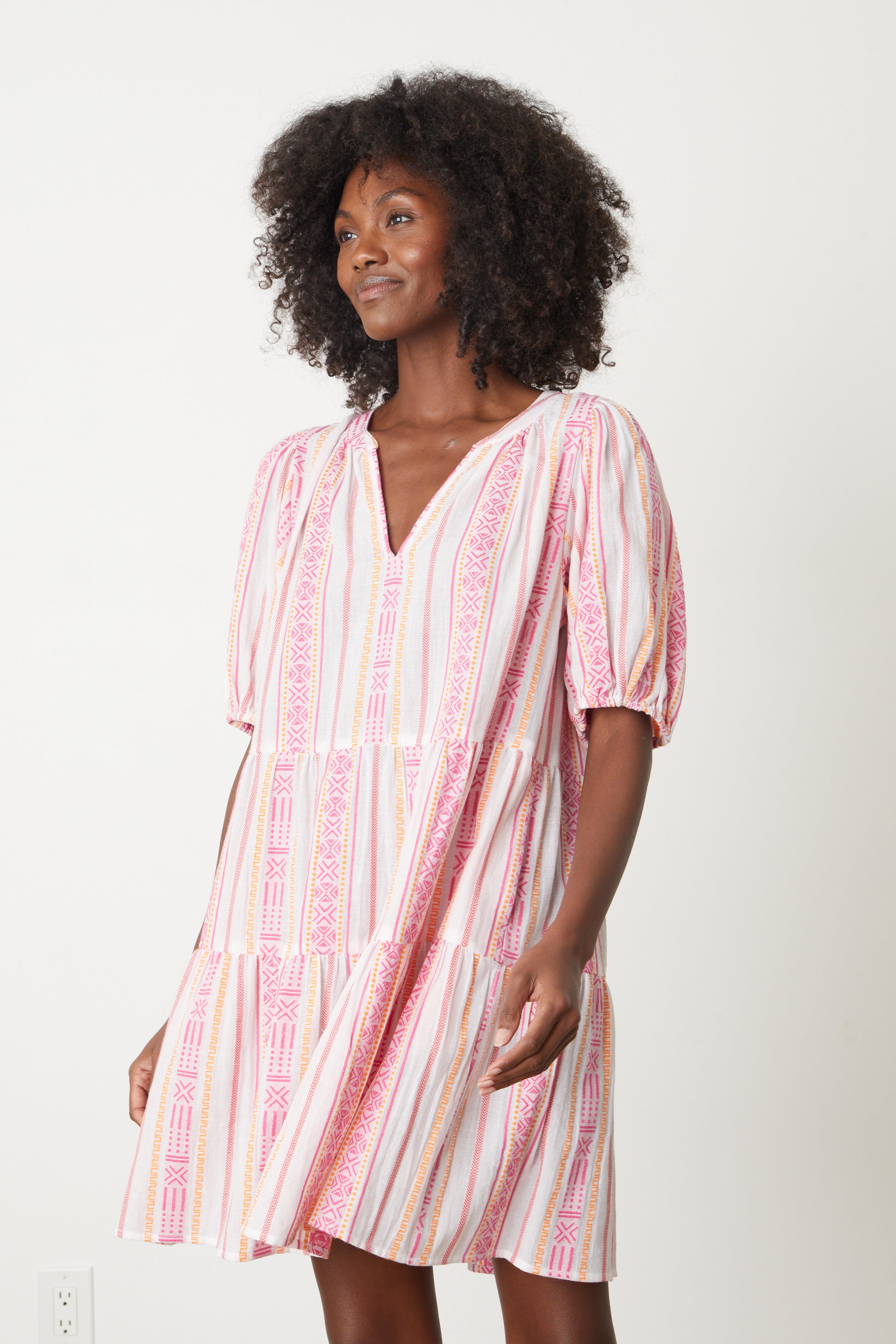   A woman wearing a Velvet by Graham & Spencer MONIQUE JACQUARD BOHO DRESS. 