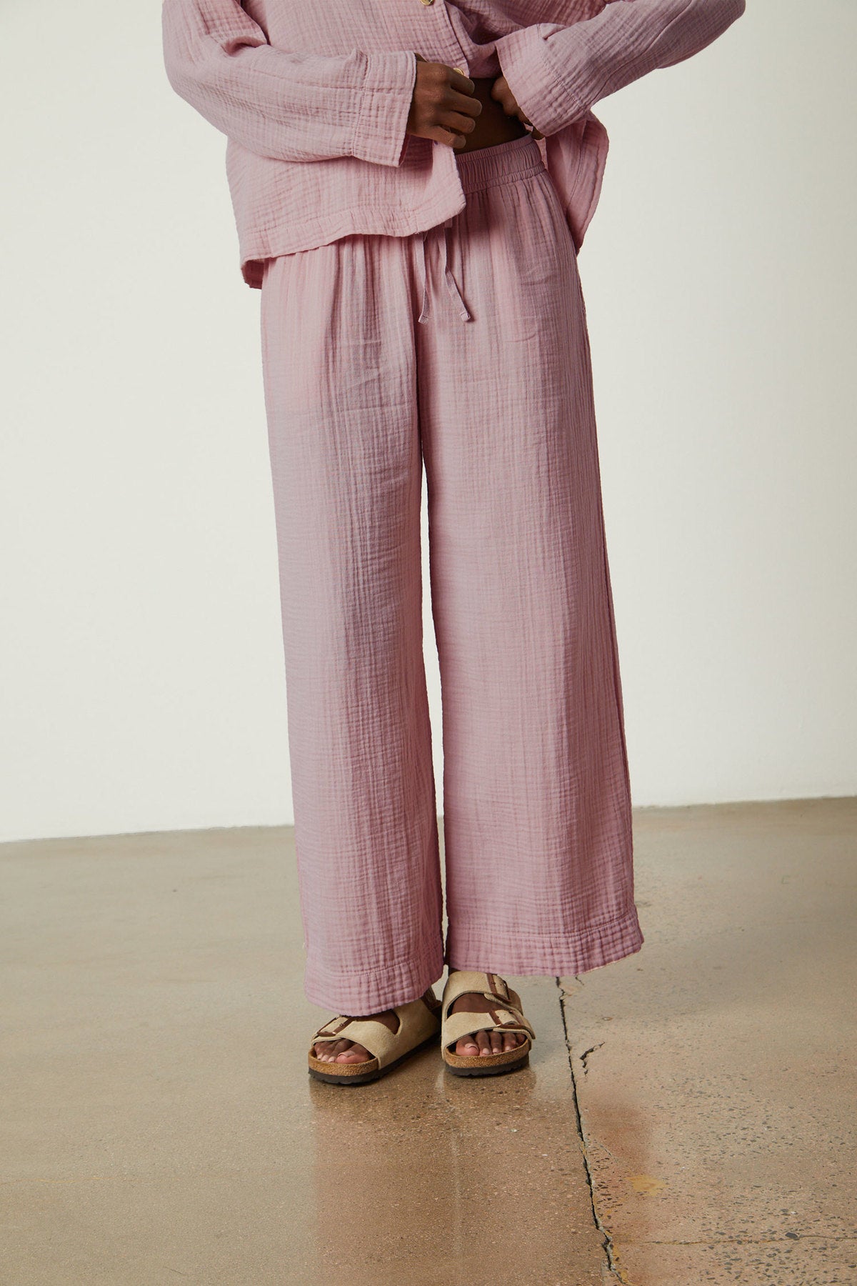a woman wearing pink Jenny Graham Home PAJAMA PANT and sandals.-26311382663361