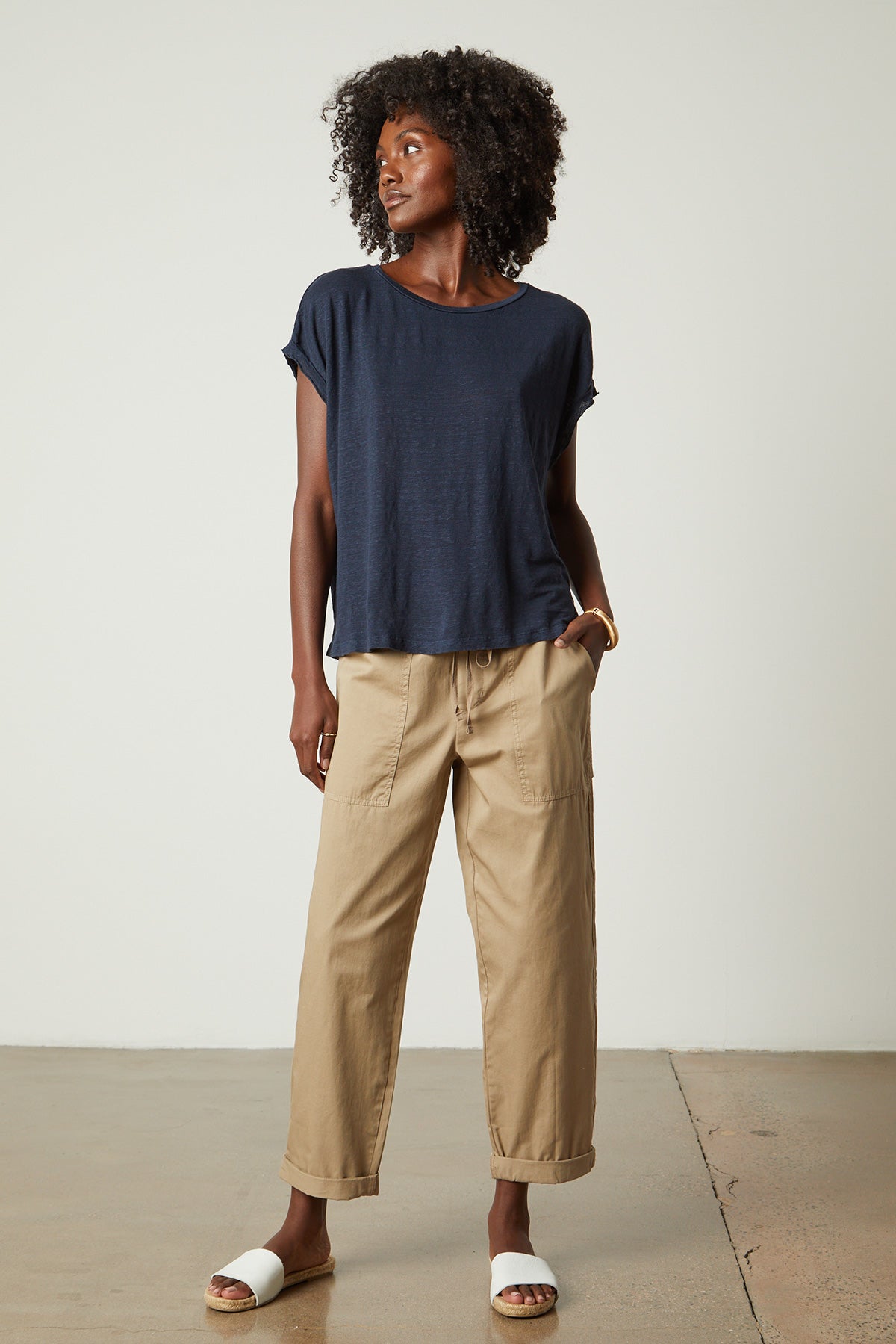 Misty Pant in oak twill with Hudson Tee in baltic full length front with white slides-26496414777537