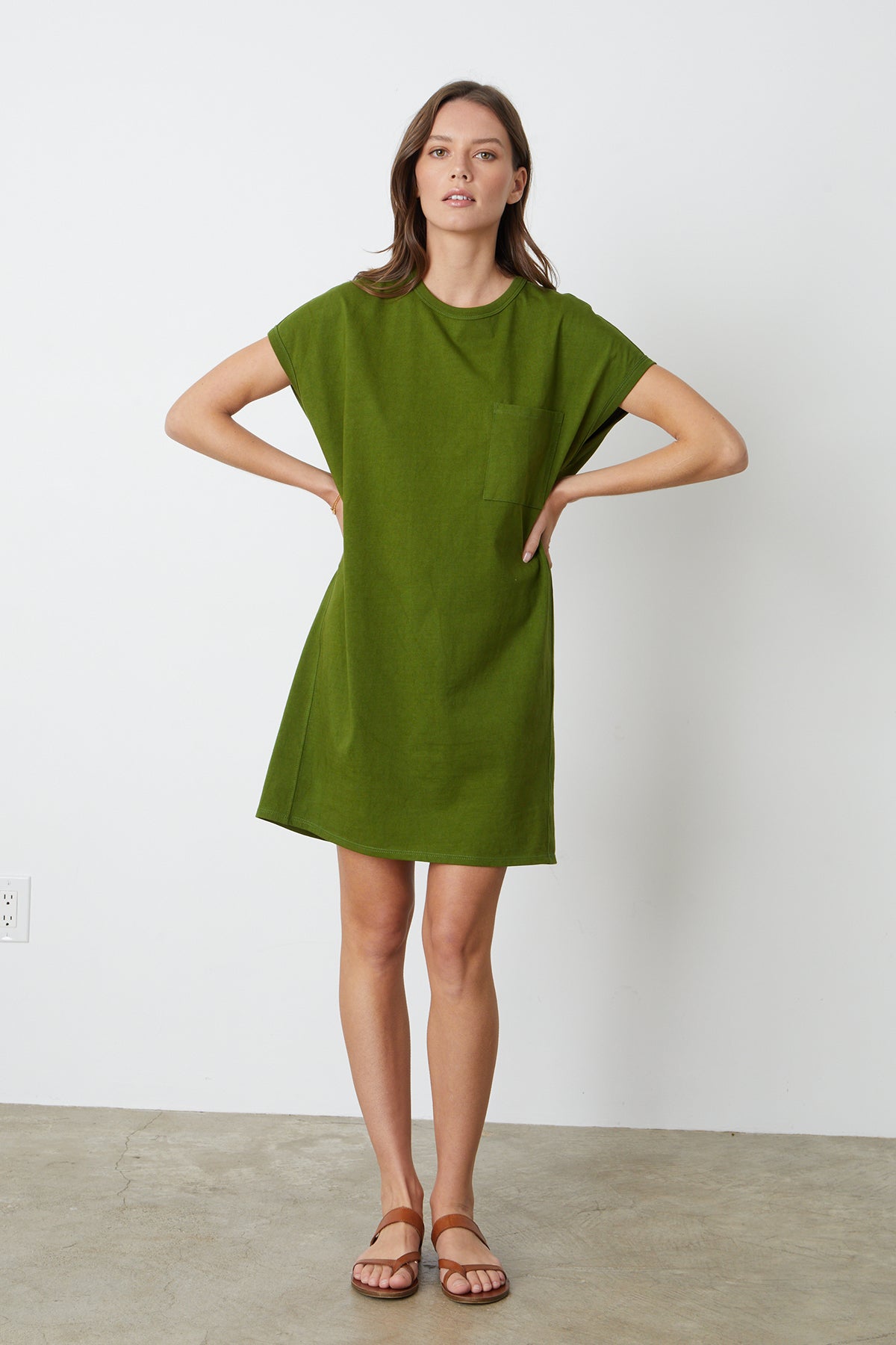 a model wearing a green Velvet by Graham & Spencer Cassidy Crew Neck Dress and sandals.-26342692651201