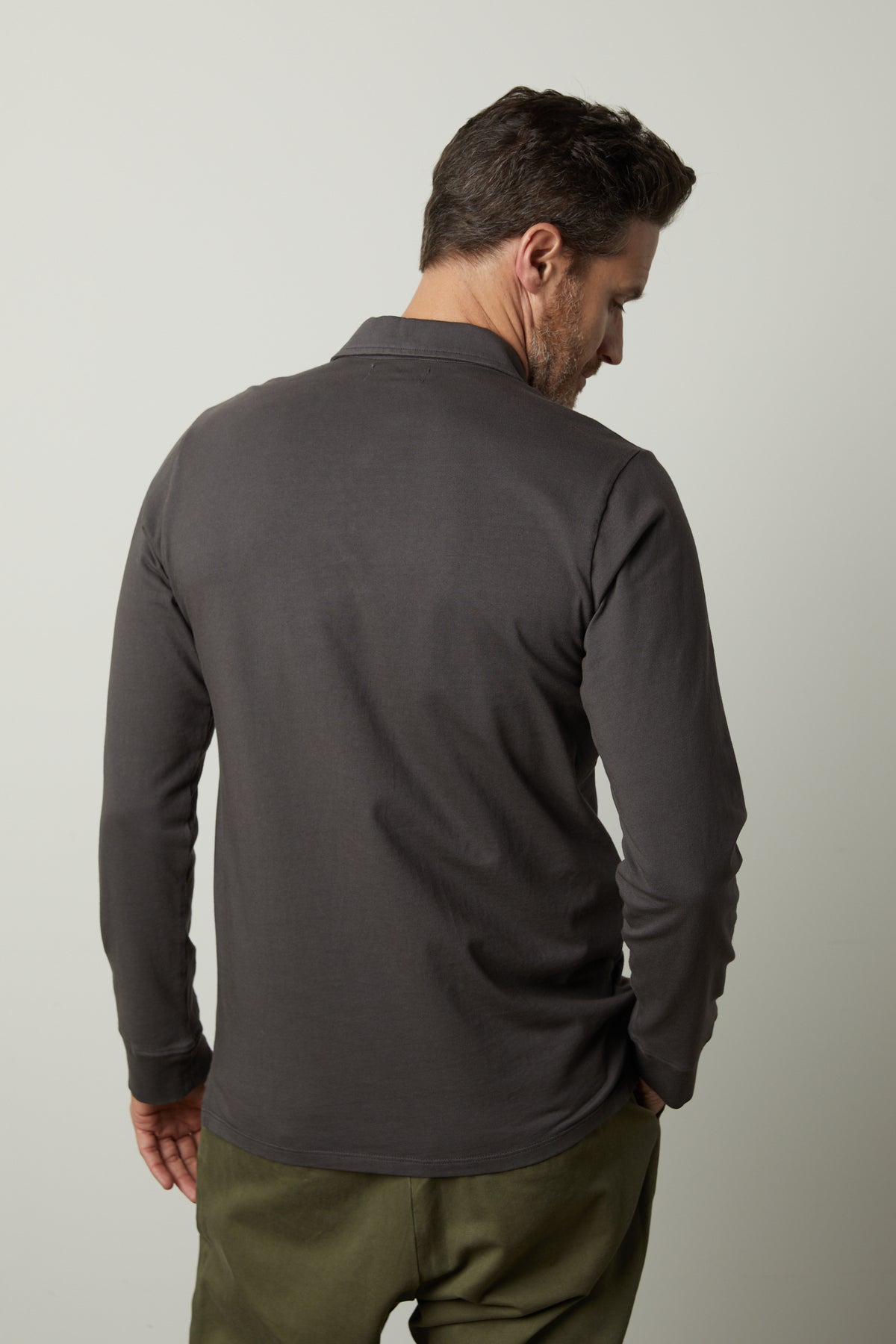 The back view of a man wearing a Velvet by Graham & Spencer KOLBE POLO.-26827672092865