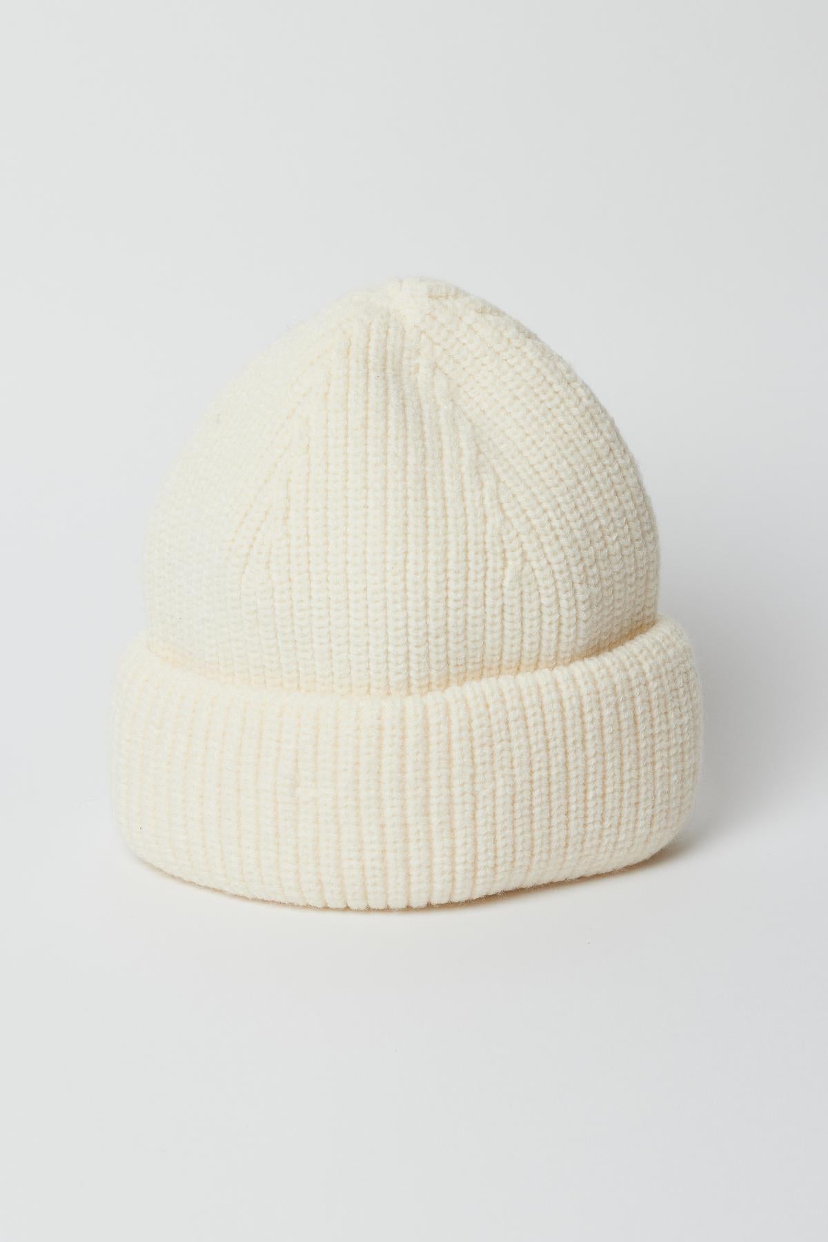   A comfortable MAJOR BEANIE by Velvet by Graham & Spencer on a white background, perfect for winter weather. 