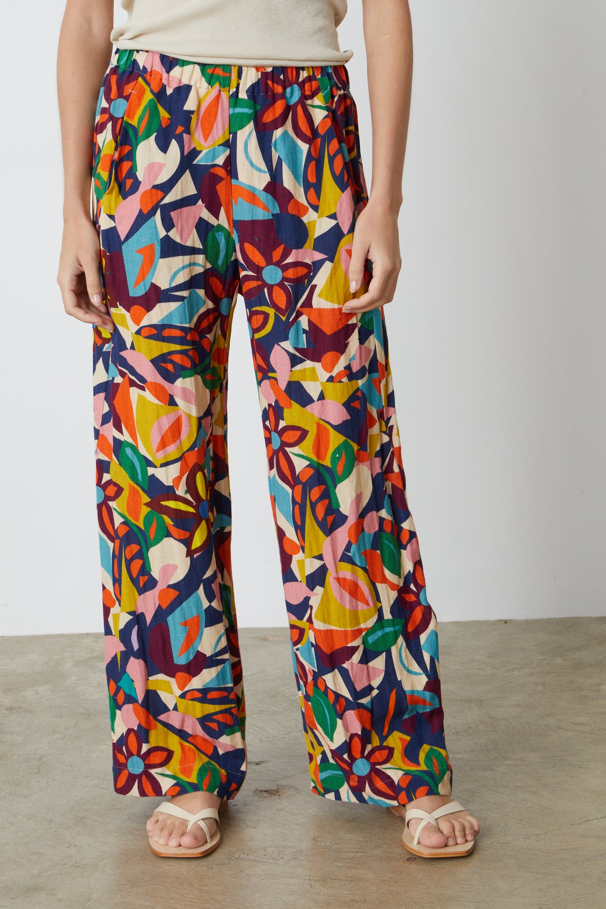 A woman wearing a Velvet by Graham & Spencer BETHANY PRINTED LINEN PANT.-26774788145345