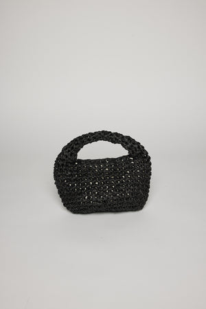 A stylish black woven MICRO SLOUCH BAG with two handles, standing upright on a plain white background by Velvet by Graham & Spencer.