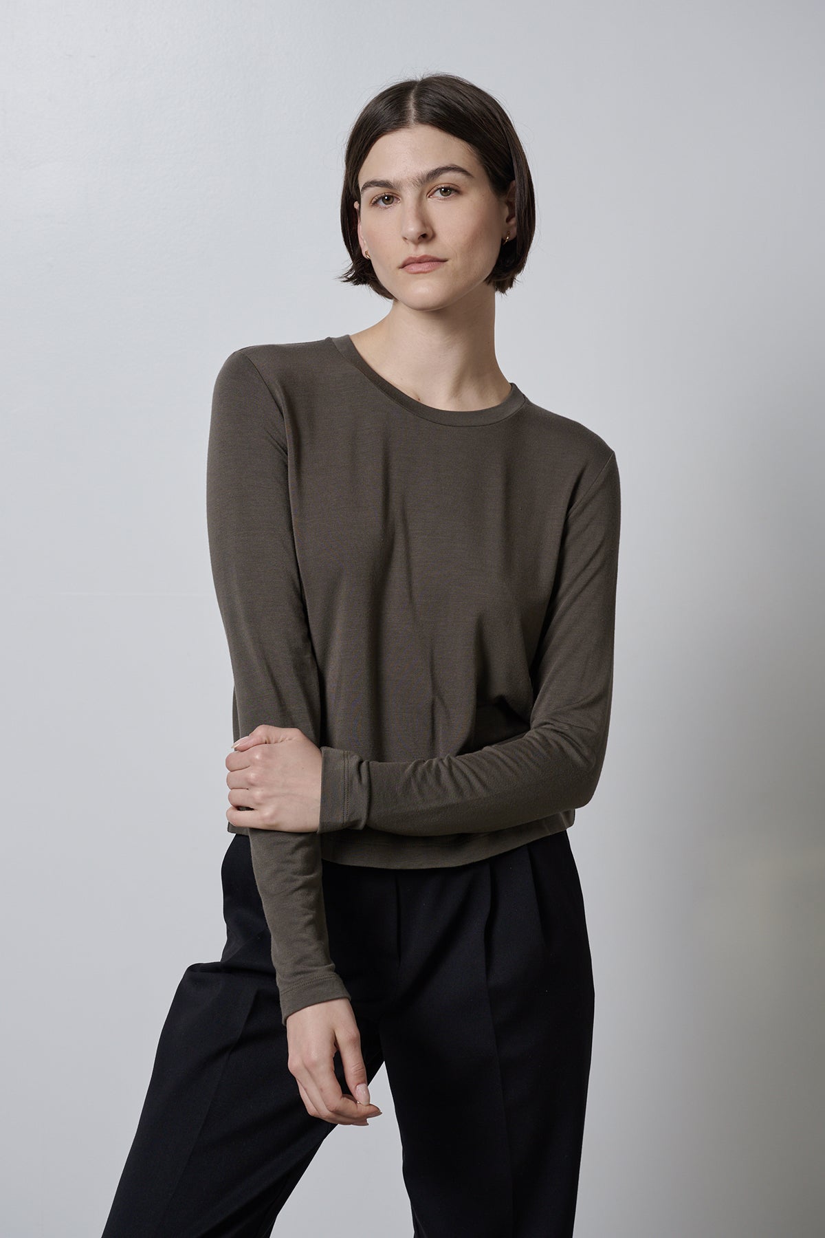 The model is wearing a Velvet by Jenny Graham PACIFICA TEE and soft hand black trousers.-35416710185153