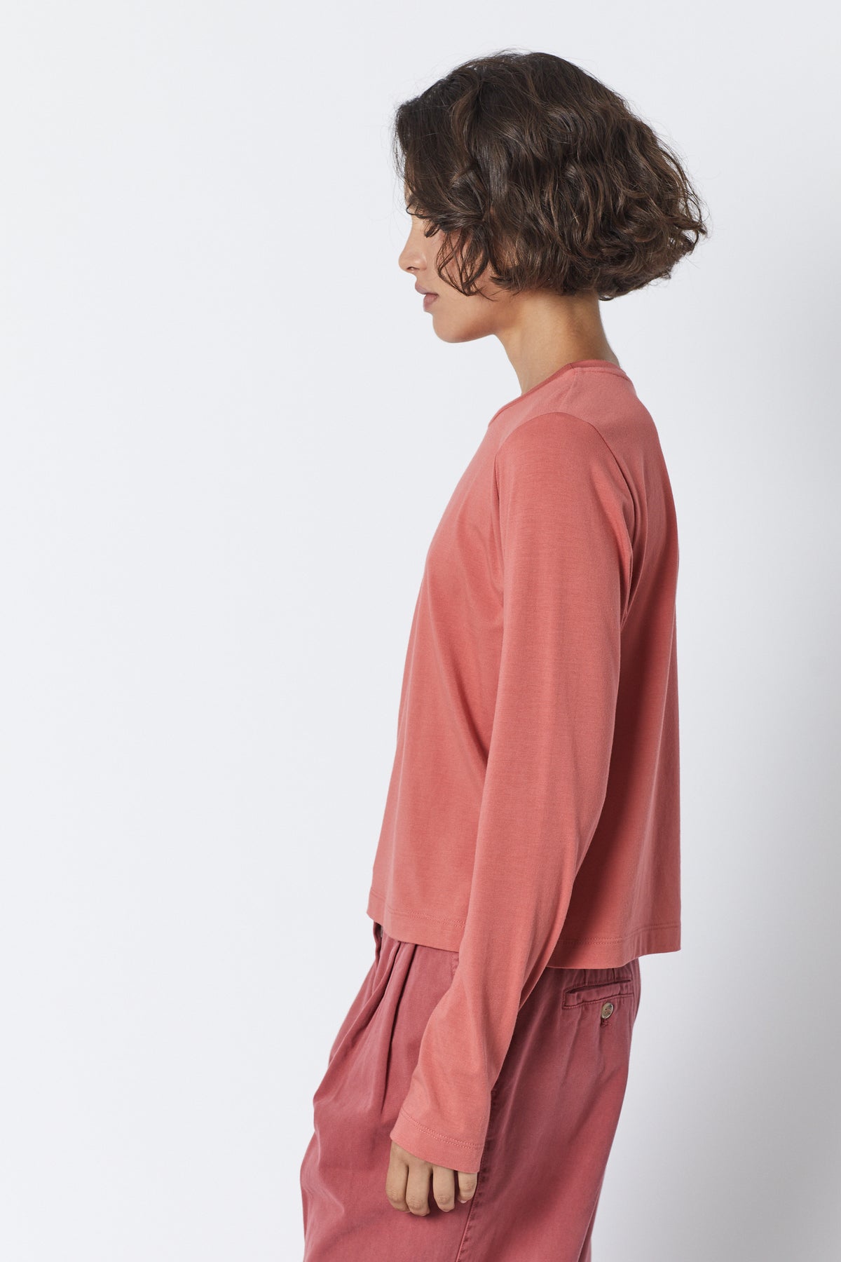   The model is wearing a Velvet by Jenny Graham soft rib knit, pink long-sleeved PACIFICA TEE top and pants. 