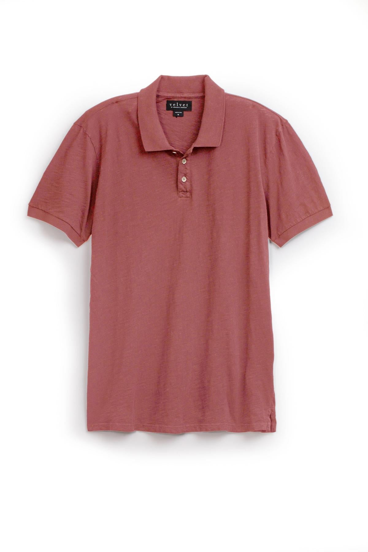  A NIKO POLO hand polo shirt in pink on a white background, giving off a vintage-feel from Velvet by Graham & Spencer. 