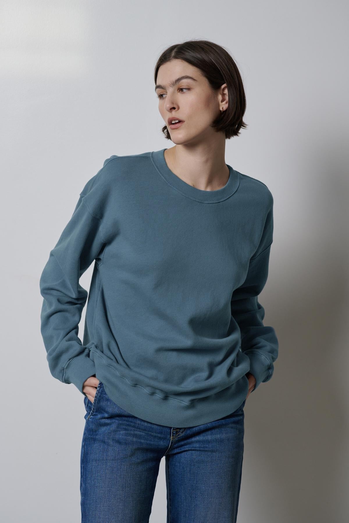   The model is wearing the Velvet by Jenny Graham Abbot sweatshirt made of organic cotton. 