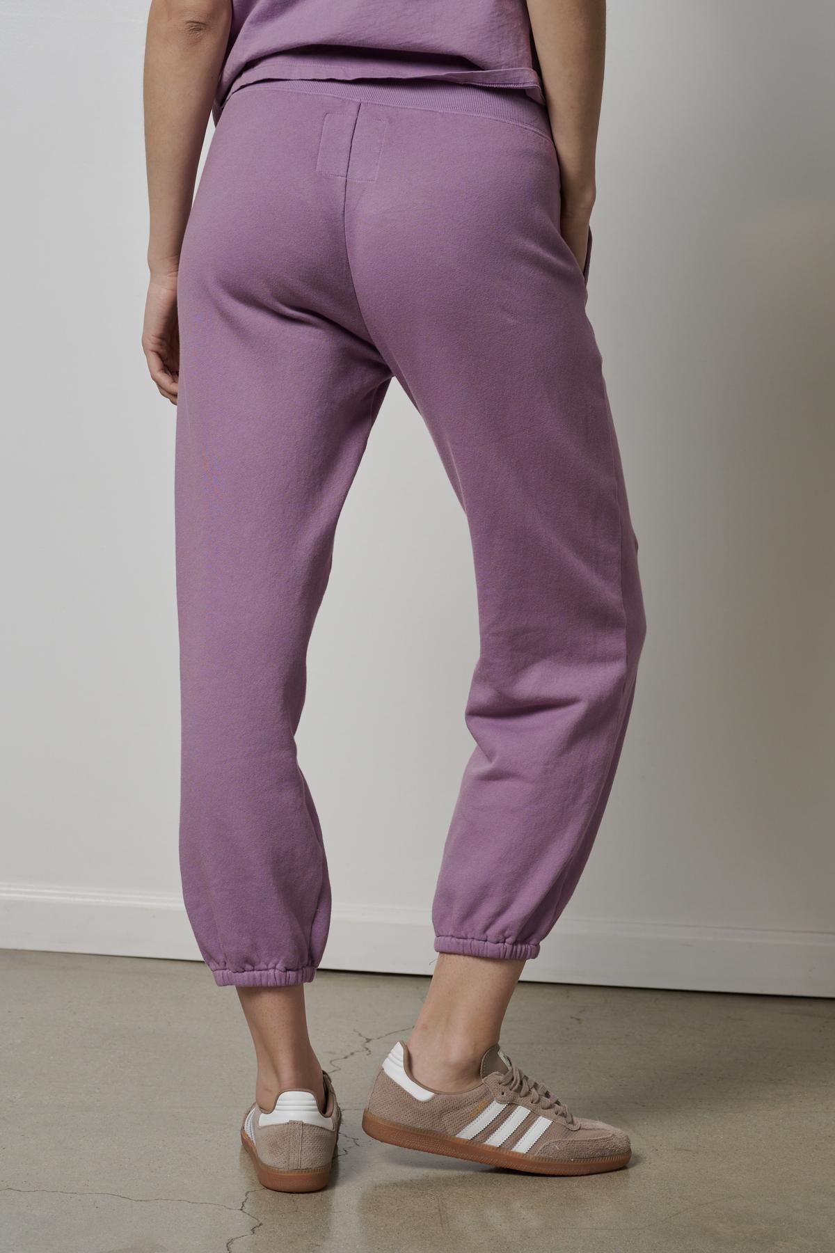 The back view of a woman wearing ZUMA SWEATPANTS by Velvet by Jenny Graham.-26827763646657