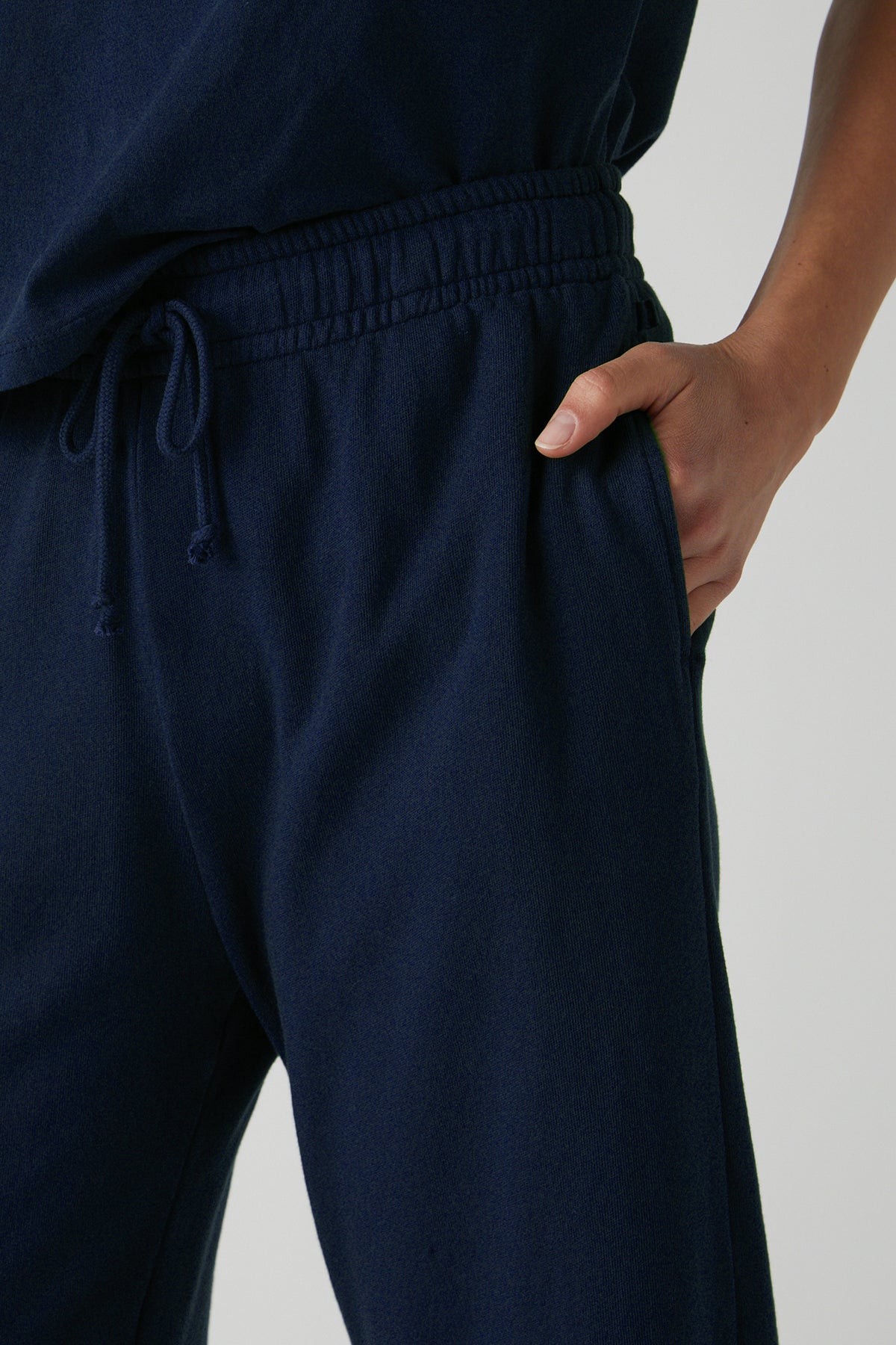 Montecito Sweatpant in Navy detail with model's hand in pocket-26458695827649