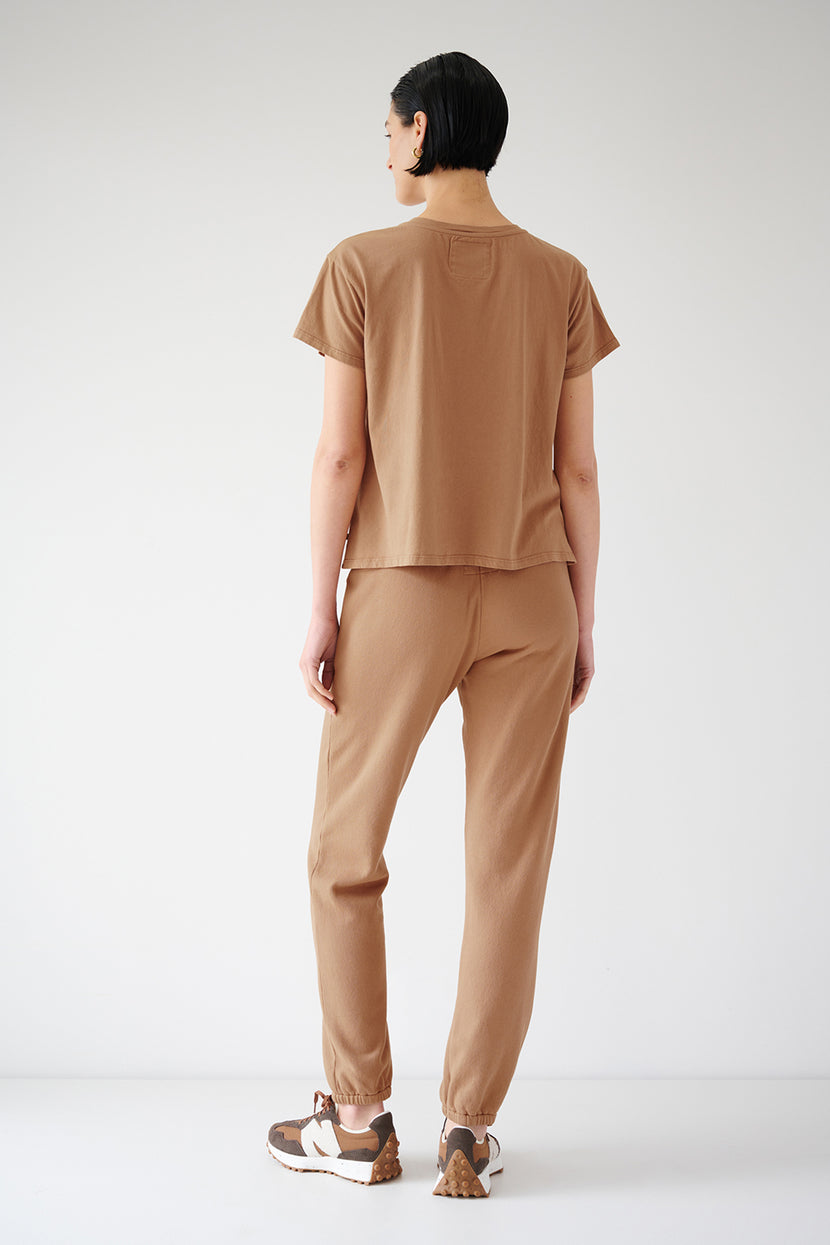 The back view of a woman wearing Velvet by Jenny Graham's ZUMA SWEATPANT joggers.