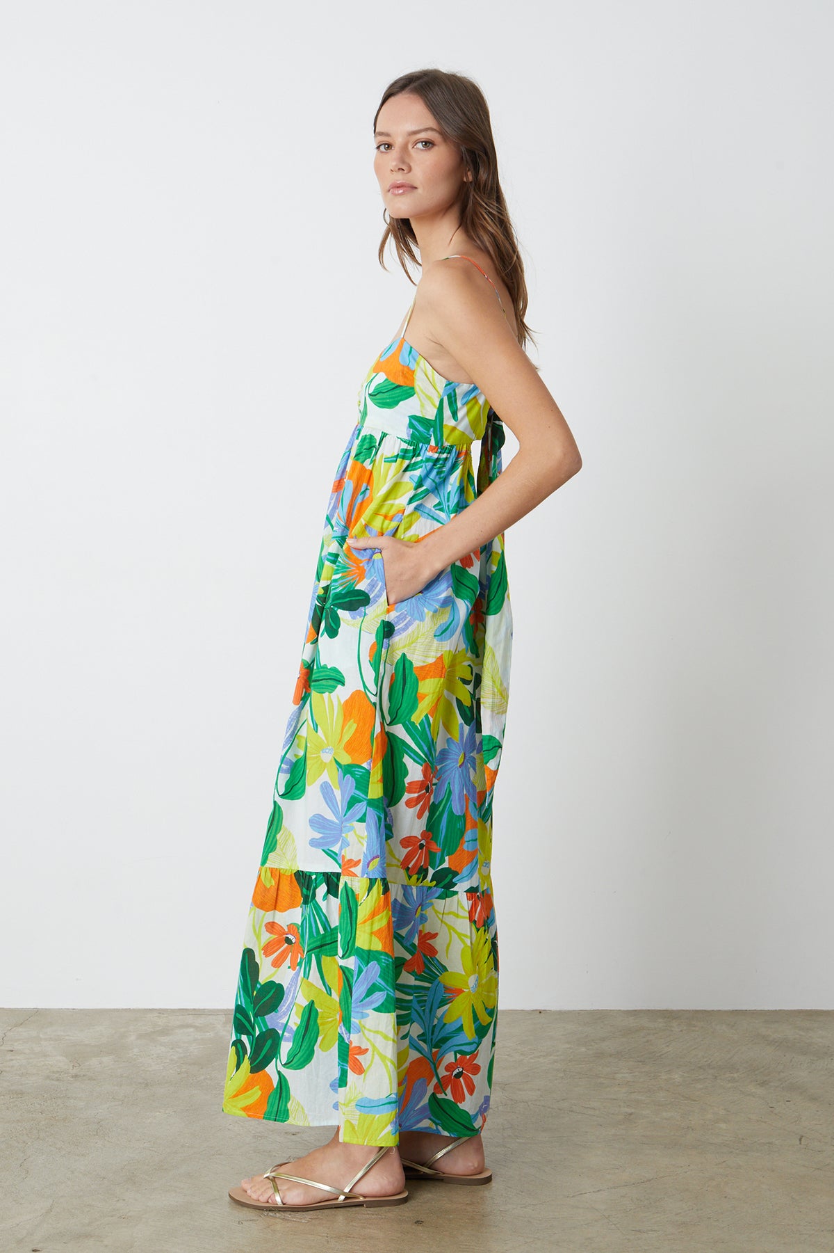 A woman wearing the Velvet by Graham & Spencer KAYLA PRINTED MAXI DRESS.-26342715556033