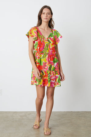 Maeve Tiered Dress in bold floral aloha print with reds, hot pinks and greens full length front 